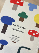 Laden Sie das Bild in den Galerie-Viewer, KINSHIPPED x Ayesha Pearce - Notizbuch A5 - Woodland