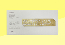 Load image into Gallery viewer, TRAVELER&#39;S COMPANY – Brass Template Bookmark Alphabet