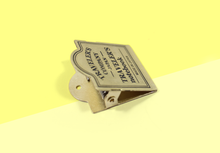 Load image into Gallery viewer, TRAVELER&#39;S COMPANY – Traveler&#39;s Notebook Brass - 030 Brass Clip Logo